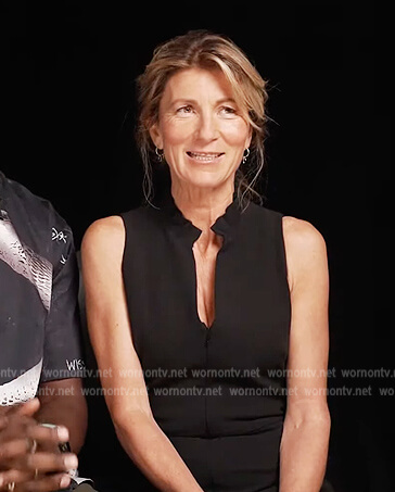 Eve Best's black ruffle neck jumpsuit on Extra