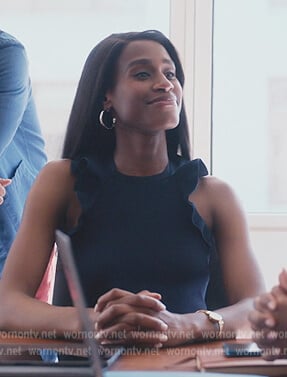 Jessie's navy ruffle neck jumpsuit on Everythings Trash