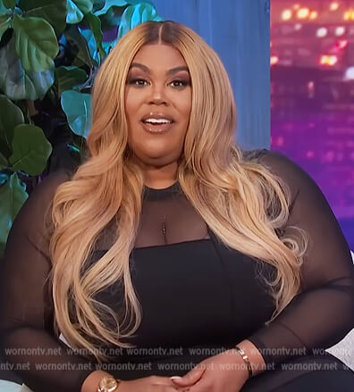 Nina's black sheer panel dress on E! News Nightly Pop
