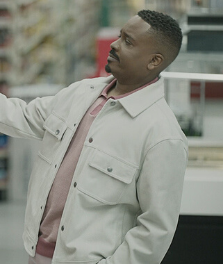 Shaad's white leather jacket on The Chi