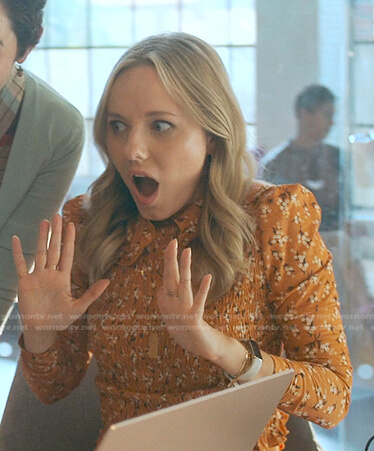 Claire's orange floral smocked top on Good Trouble