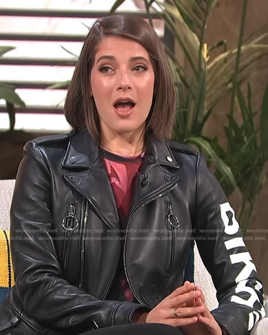 Daryn Carp’s black leather biker jacket on E! News Daily Pop