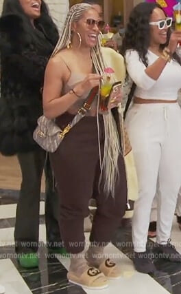 Drew's GG logo teddy jacket and slides on The Real Housewives of Atlanta