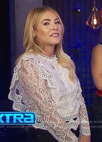 Kate Krause’s white lace ruffle blouse on Extra