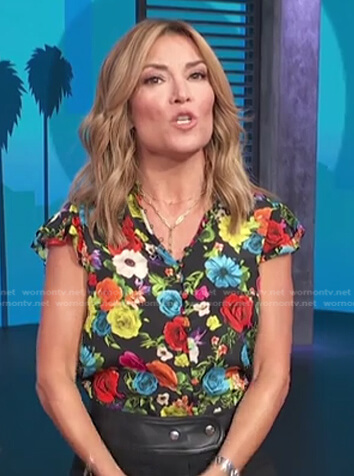 Kit's black floral blouse on Access Hollywood