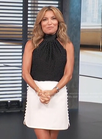 Kit's white mini skirt on Access Hollywood