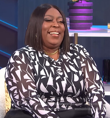 Loni's printed mesh top on E! News Nightly Pop