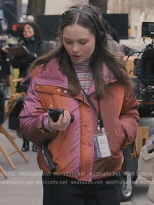 Lucy's puffer jacket and sneakers on Only Murders in the Building
