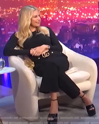 Morgan's black GG belted pants on E! News Nightly Pop