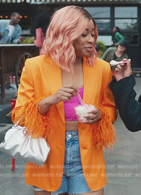 Phoebe's orange feather cuff blazer on Everythings Trash
