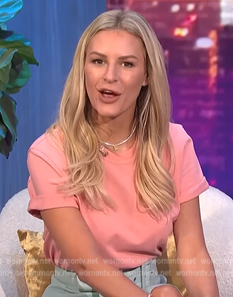 Morgan's pink tee and belted skirt on E! News Nightly Pop