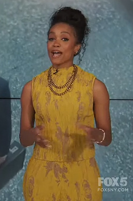 Rachel's yellow textured top on Extra