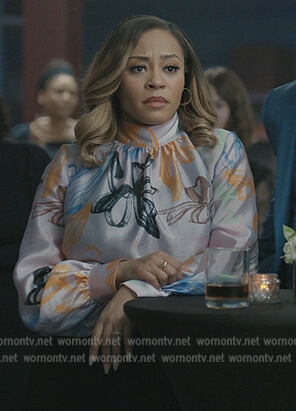 Tracey's purple floral print blouse on The Chi
