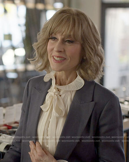 Virginia's white ruffled blouse on American Horror Stories
