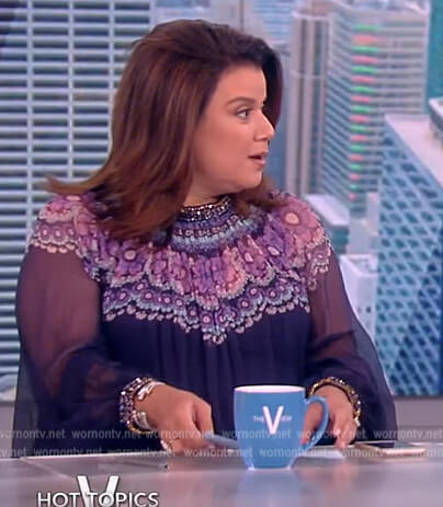 Ana's purple floral print sheer blouse on The View