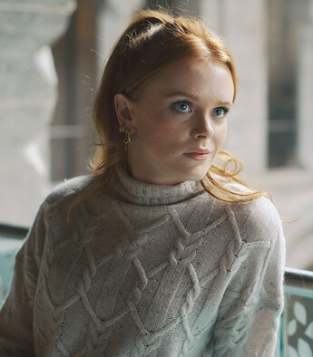 Bloom's speckled cable knit sweater on Fate The Winx Saga