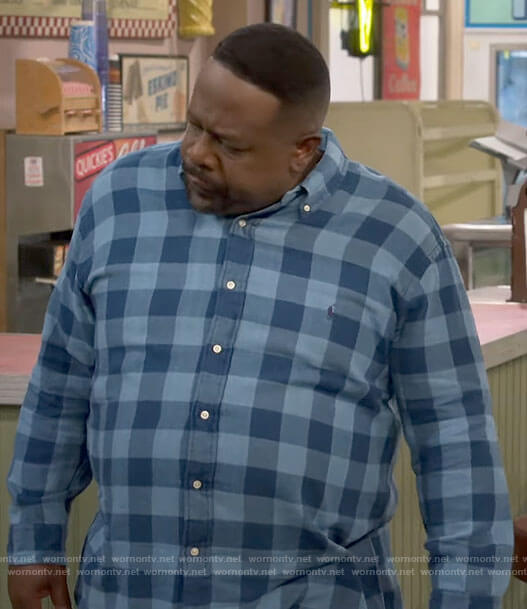 Calvin's blue checked shirt on The Neighborhood