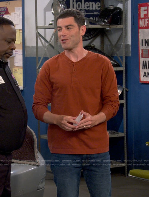 Dave's brown long sleeved henley tee and Nike sneakers on The Neighborhood