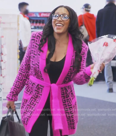 Drew's pink monogram logo cardigan on The Real Housewives of Atlanta