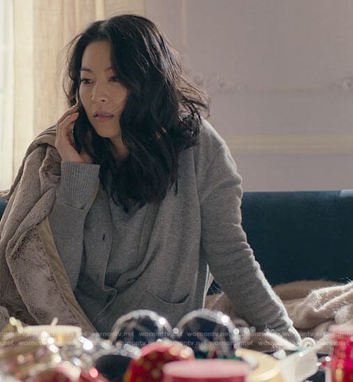 Ingrid's grey sweater and cardigan on Partner Track