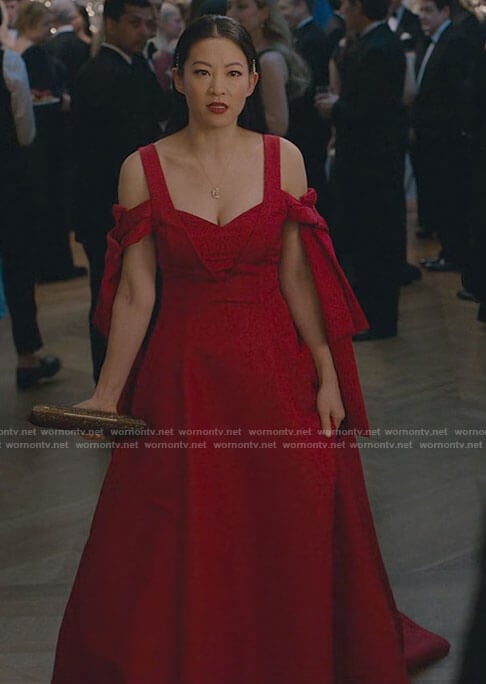Ingrid's red tie sleeve gown on Partner Track