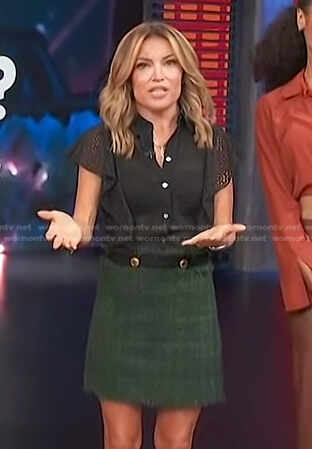 Kit's black ruffle eyelet top and green mini skirt on Access Hollywood