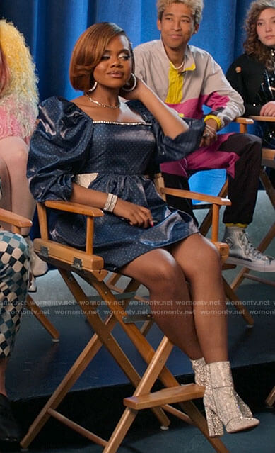 Kourtney's blue polka dot puff-sleeve dress and sparkly boots on High School Musical The Musical The Series