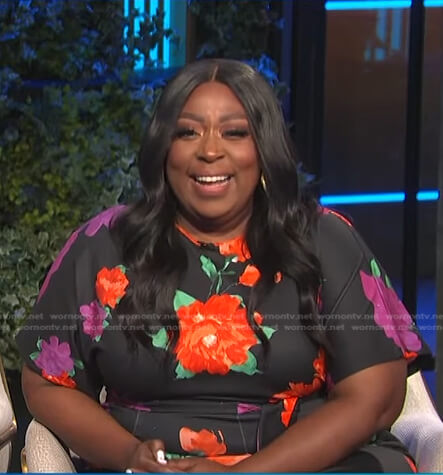 Loni's black floral tie waist jumpsuit on E! News Daily Pop