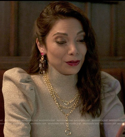 Nikki's metallic puff sleeve sweater and rectangle earrings on She-Hulk Attorney at Law