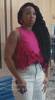 Phoebe's pink ruffle top and zebra stripe jeans on Everythings Trash