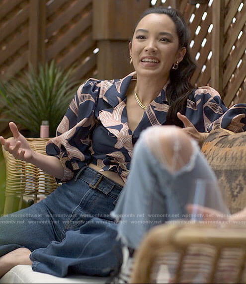 Sam's friend's printed cropped top and belted jeans on American Horror Stories
