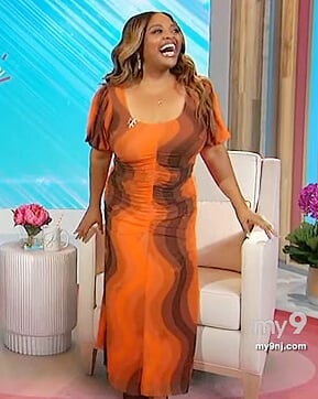 Sherri's orange swirl print dress on Sherri