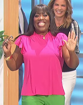 Sheryl's pink flutter sleeve top on The Talk