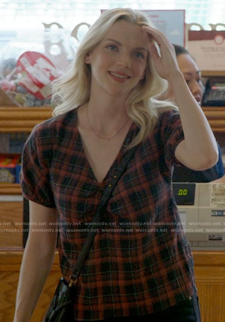 Sylvie's plaid v-neck top on Chicago Fire