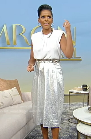 Tamron's white chain embellished top and skirt on Tamron Hall Show