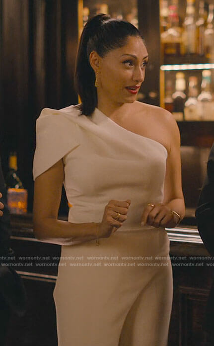 Victoria's white one-shoulder asymmetric top on Partner Track