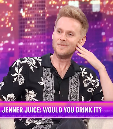 Zach Noe Towers black floral print shirt on E! News Nightly Pop