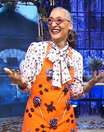 Carla Hall's white print tie neck blouse on Good Morning America