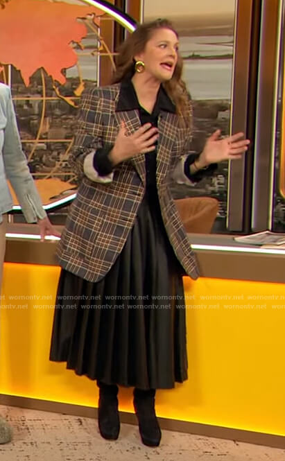 Drew's plaid blazer and pleated skirt on The Drew Barrymore Show