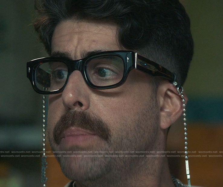 Harry's glasses and chain on The Equalizer