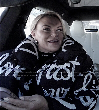 Heather's black graphic print puffer jacket on The Real Housewives of Salt Lake City