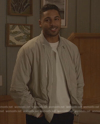 Jordan's white zip up bomber jacket on All American