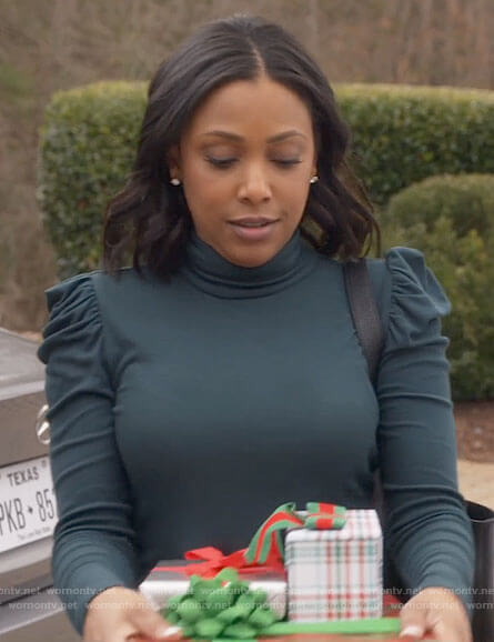 Kayla's green puff-sleeve turtleneck top on Monarch