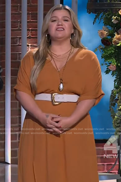 Kelly's orange metallic wrap dress on The Kelly Clarkson Show