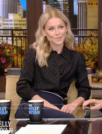 Kelly's black satin blouse and skirt on Live with Kelly and Ryan