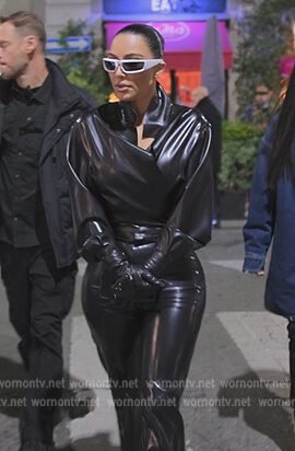 Kim's black latex shirt and pants on The Kardashians
