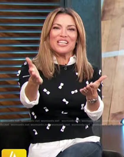 Kit's black bow embellished short sleeve sweater on Access Hollywood