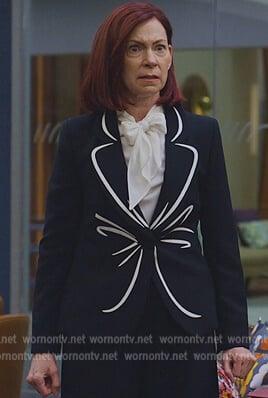 Elsbeth's contrast bow front blazer on The Good Fight