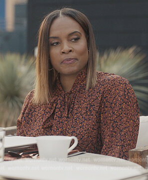 Sally's floral print tie neck blouse on Reasonable Doubt