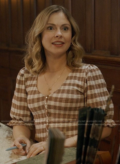 Sam's brown plaid top on Ghosts